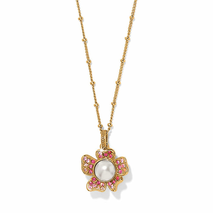 Brighton pendant necklace with gold-plated flower, glass pearl center, and pink crystal petals on a white background
