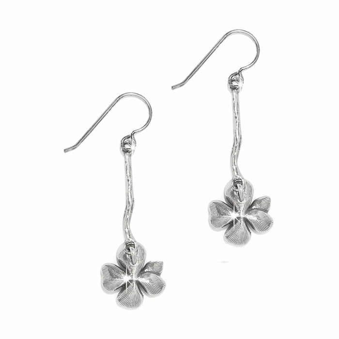 Brighton drop earrings with silver-plated flower charms suspended from slender textured bars on a white background