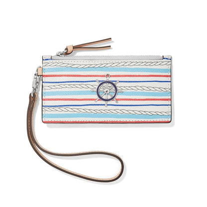 Brighton wristlet wallet with nautical stripe and rope print, ship wheel charm, and leather strap on a white background