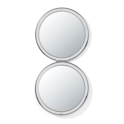 Brighton round compact mirror shown open with silver-tone frame and dual mirrored surfaces on a white background