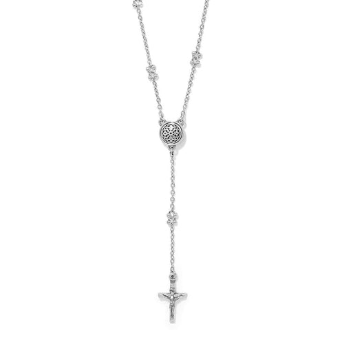 Brighton silver-plated rosary necklace with beaded chain, filigree medallion, and crucifix drop on a white background