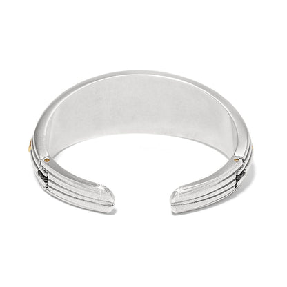 Brighton cuff bracelet shown from the back with two-tone silver and gold finish and ribbed ends on a white background