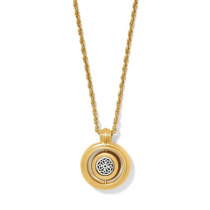 Brighton pendant necklace with gold-plated circular frame and silver-tone filigree medallion center on a white background