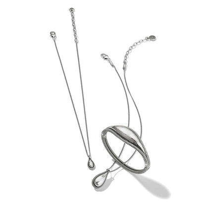 Brighton silver-plated pendant necklace and bangle bracelet with hammered teardrop accents and textured details on a white background