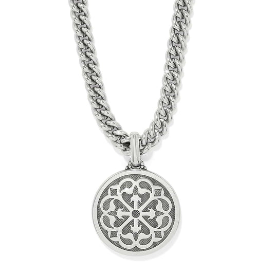 Brighton pendant necklace with silver-plated openwork medallion and curb chain on a white background