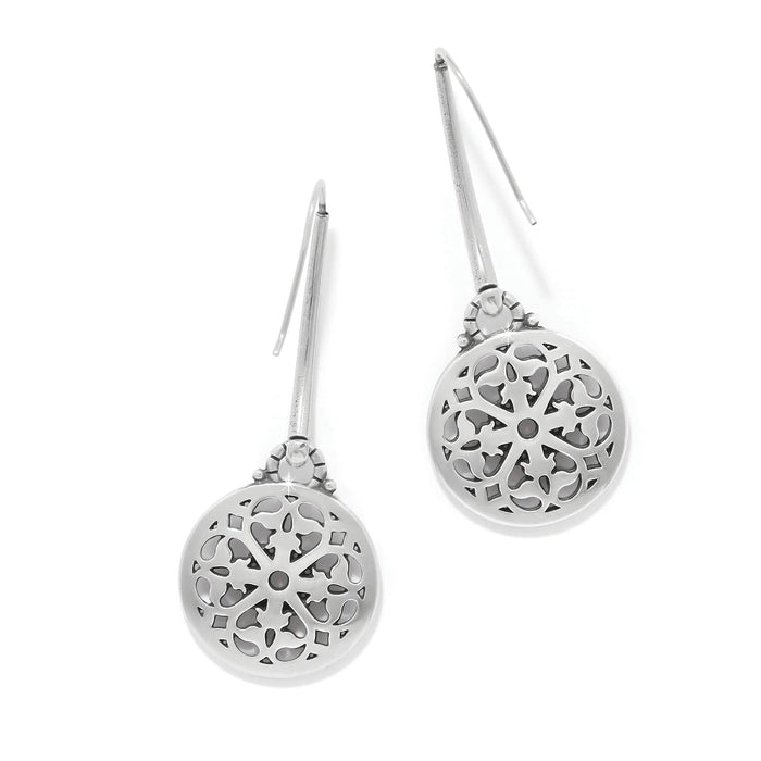 Brighton drop earrings with silver-plated round filigree medallions and crystal accents on long hooks on a white background