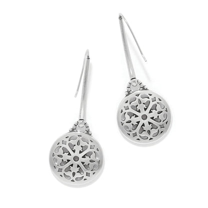 Brighton drop earrings with silver-plated round filigree medallions and crystal accents on long hooks on a white background