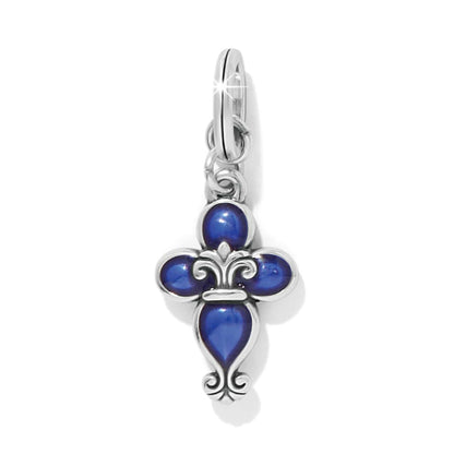 Brighton charm with silver-plated fleur-de-lis cross design and blue enamel detailing on a white background