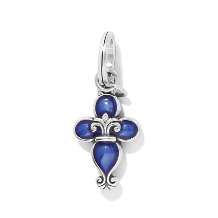 Brighton fleur-de-lis cross charm with blue enamel and silver-plated scroll detailing on a white background