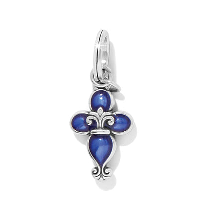 Brighton fleur-de-lis cross charm with blue enamel and silver-plated scroll detailing on a white background