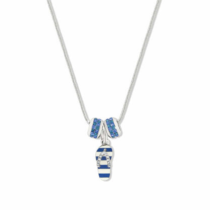 Brighton pendant necklace with blue striped enamel flip-flop charm and two silver-plated crystal rings on a white background