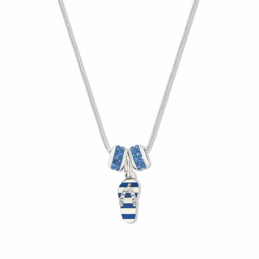 Brighton pendant necklace with blue striped enamel flip-flop charm and two silver-plated crystal rings on a white background