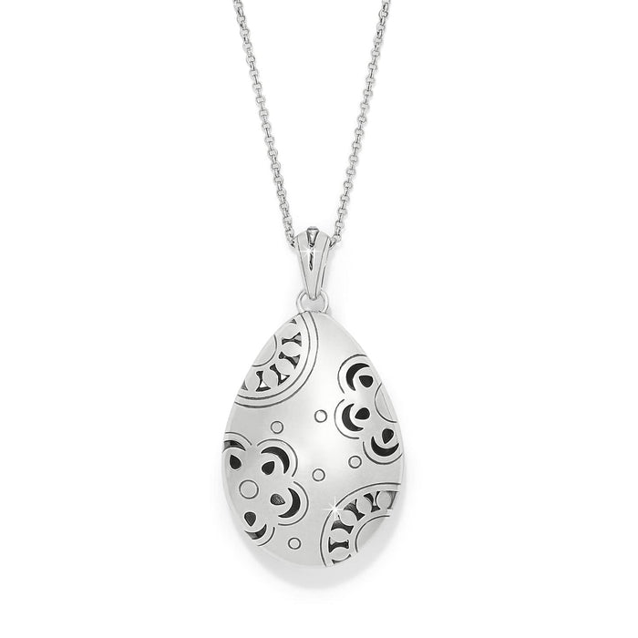 Brighton pendant necklace with silver-plated teardrop pendant featuring engraved swirl patterns and enamel accents on a white background