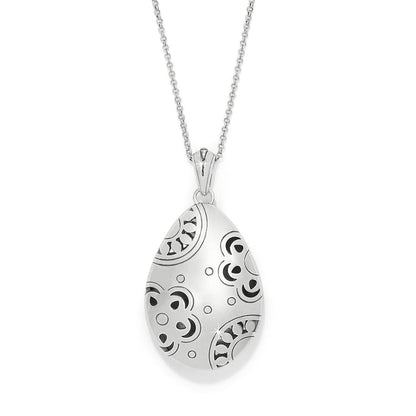Brighton pendant necklace with silver-plated teardrop pendant featuring engraved swirl patterns and enamel accents on a white background