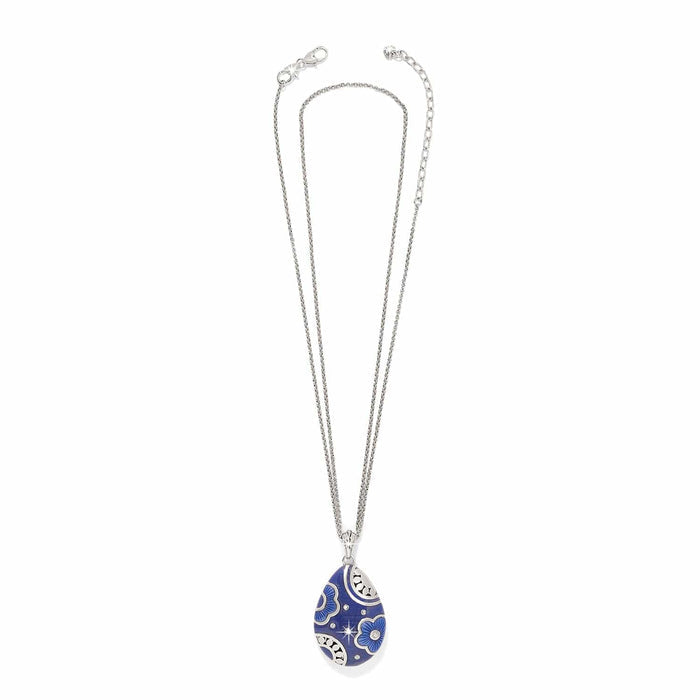 Brighton pendant necklace with blue enamel teardrop, silver-plated floral details, and crystal accents on a white background