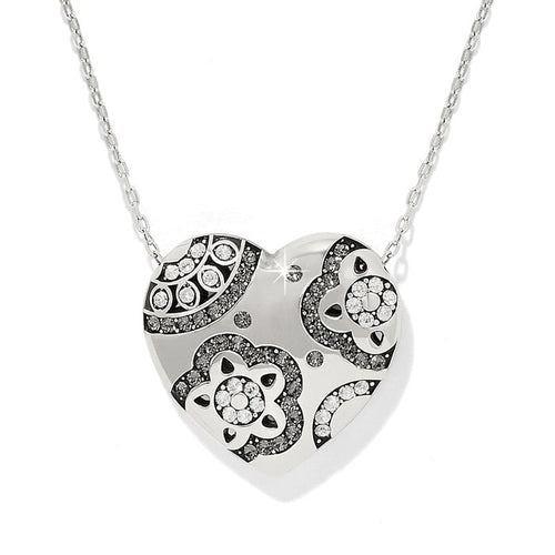 Brighton heart pendant necklace with silver-plated finish and crystal floral motifs on a white background