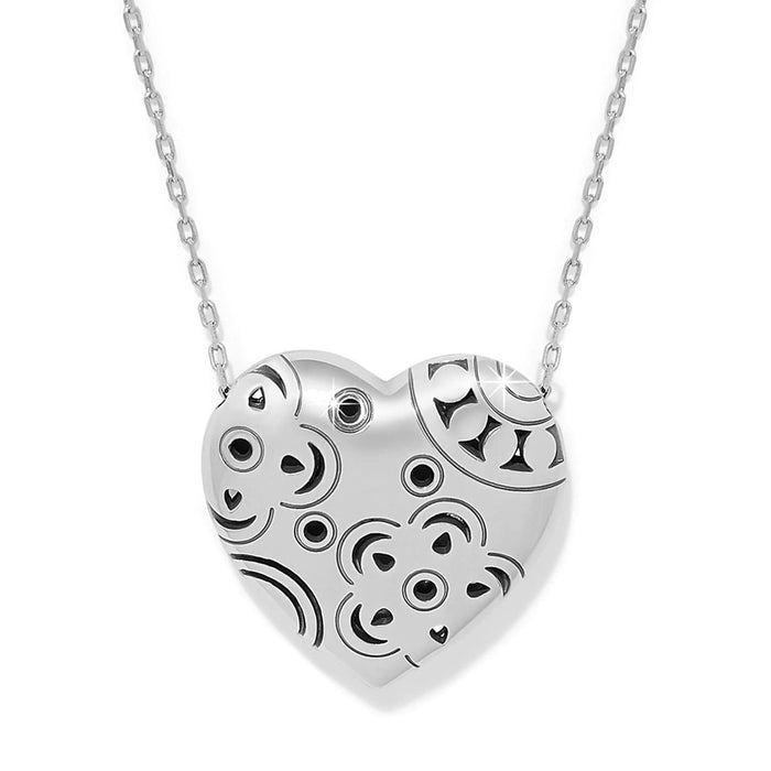 Brighton heart pendant necklace with silver-plated finish and engraved swirl pattern on a white background