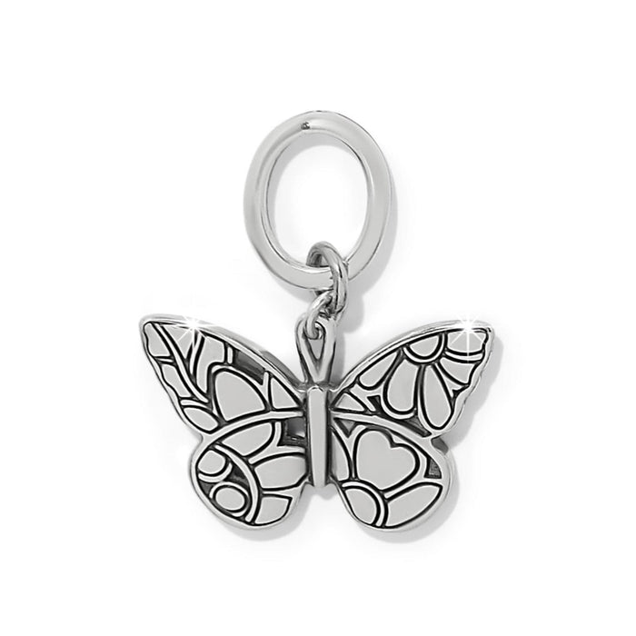 Brighton butterfly charm with silver-plated finish and detailed wing engravings on a white background