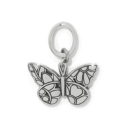 Brighton butterfly charm with silver-plated finish and detailed wing engravings on a white background