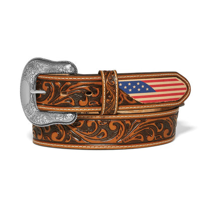 Brighton tooled leather belt with American flag tip, scroll embossing, and engraved silver-tone buckle on a white background