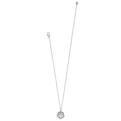 Brighton silver-plated necklace with floral pendant featuring crystal accents and lobster clasp on a white background
