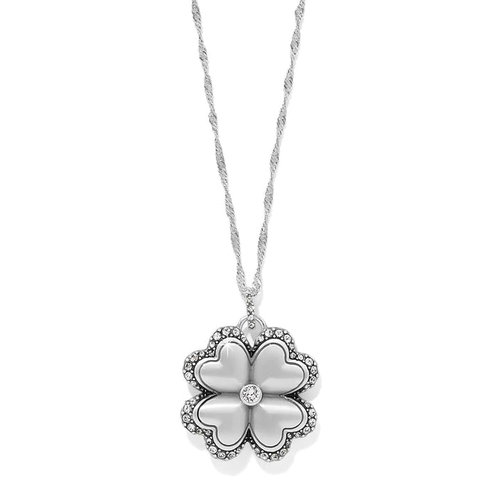 Brighton pendant necklace with silver-plated four-leaf clover, crystal-edged petals, and twisted chain on a white background