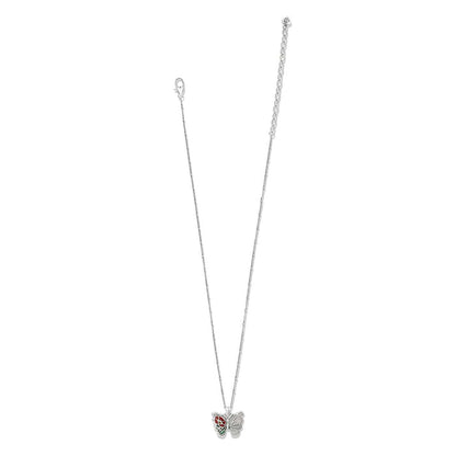 Brighton silver-plated pendant necklace with enamel butterfly featuring red and green wing details on a white background