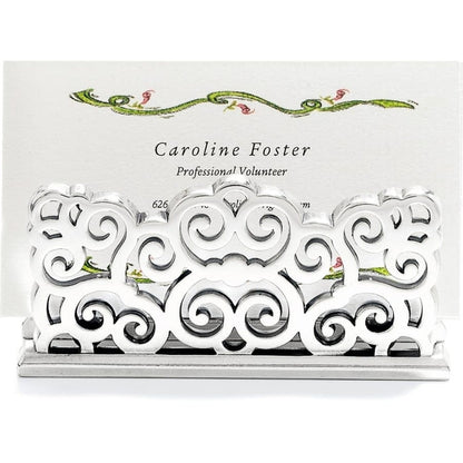 Brighton business card holder with silver-plated ornate scrollwork design holding a printed card on a white background