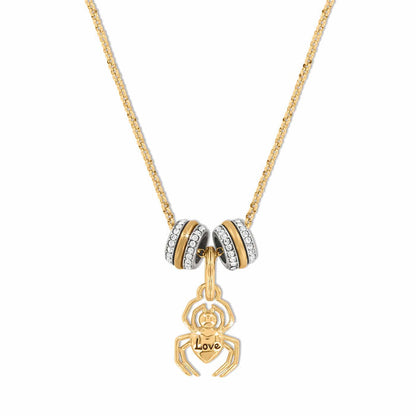 Brighton gold-plated necklace with spider charm engraved Love and two crystal-accented enamel bead spacers on a white background