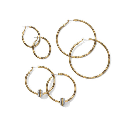 Brighton hoop earrings in three sizes with gold-plated scroll engraved finish and crystal accent rings on a white background