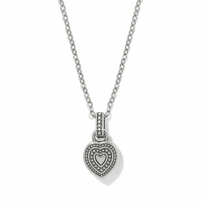 Brighton pendant necklace with silver-plated beaded heart charm on a delicate chain on a white background