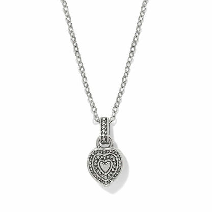 Brighton pendant necklace with silver-plated beaded heart charm on a delicate chain on a white background