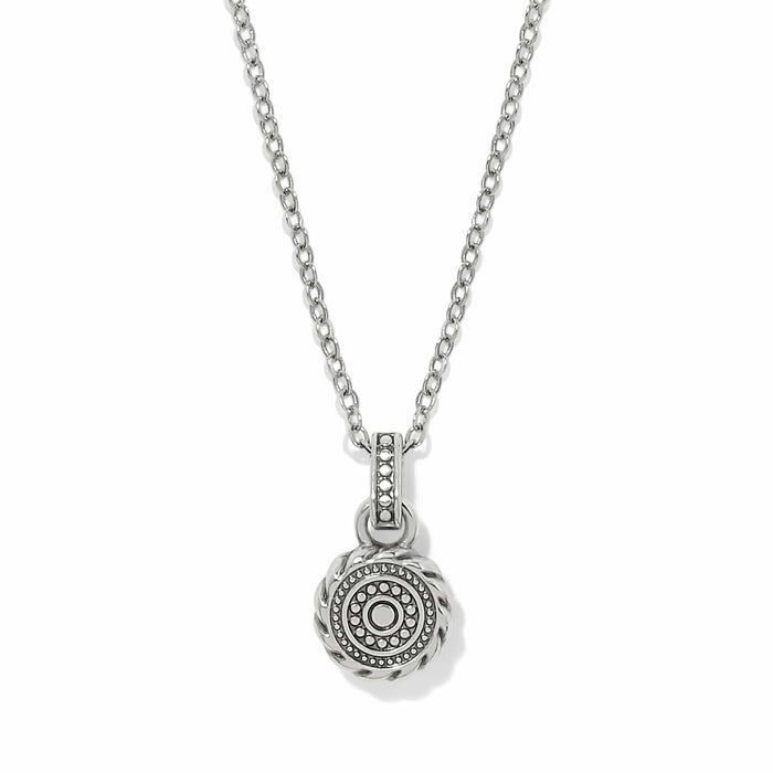 Brighton pendant necklace with silver-plated round medallion featuring beaded center and rope border on a white background
