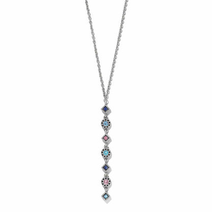 Brighton silver-plated drop necklace with alternating blue, pink, and aqua crystals in geometric settings on a white background