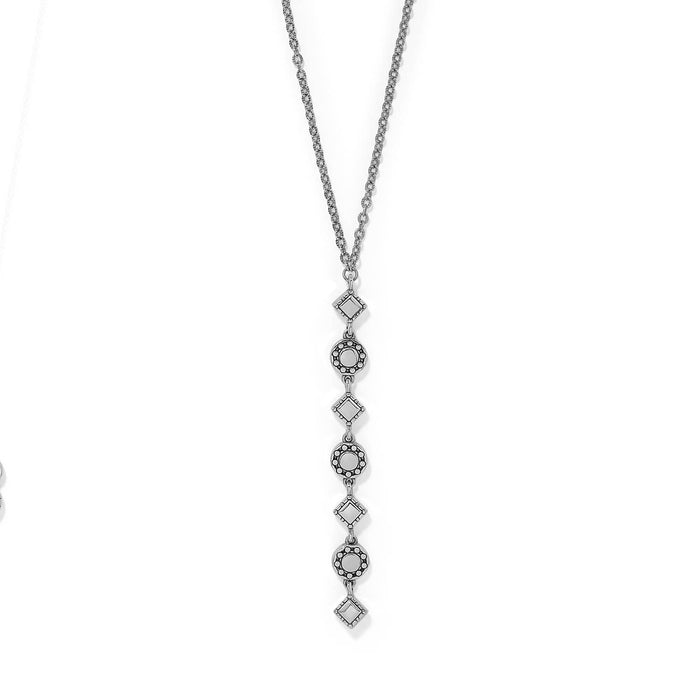 Brighton Y-drop necklace with silver-plated alternating diamond and round beaded stations on a white background