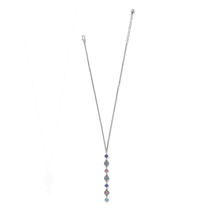 Brighton silver-plated drop necklace with vertical line of blue, pink, and aqua crystals on a white background