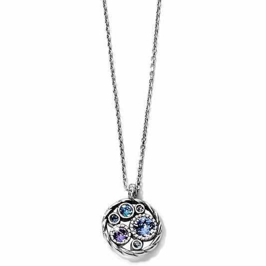 Brighton pendant necklace with silver-plated round cluster of blue and purple crystals on a white background