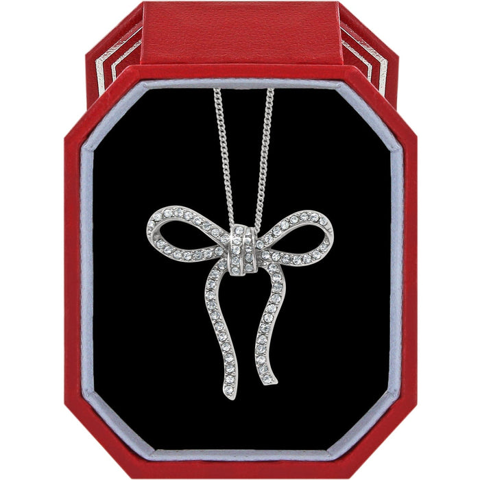Brighton bow pendant necklace with silver-plated finish and crystal accents displayed in a red gift box