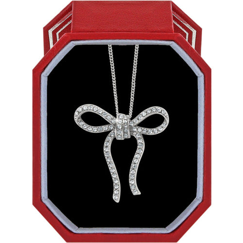 Brighton bow pendant necklace with silver-plated finish and crystal accents displayed in a red gift box