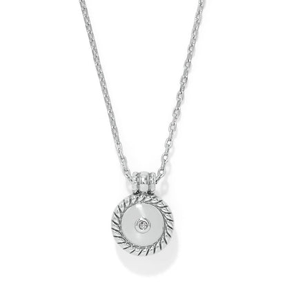 Brighton pendant necklace with silver-plated round medallion, rope-twist border, and crystal accent on a white background