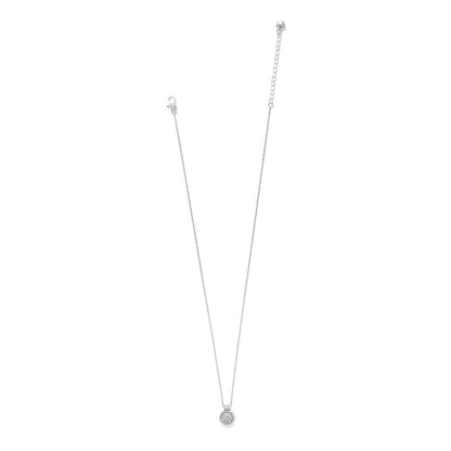 Brighton pendant necklace with small silver-plated crystal disc charm and lobster clasp extender on a white background
