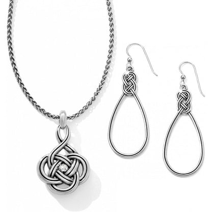 Brighton pendant necklace with Celtic knot and crystal accent, paired with matching teardrop knot earrings on a white background