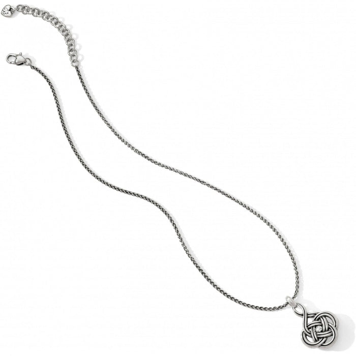 Brighton pendant necklace with silver-tone Celtic knot charm, crystal accent, and adjustable chain on a white background