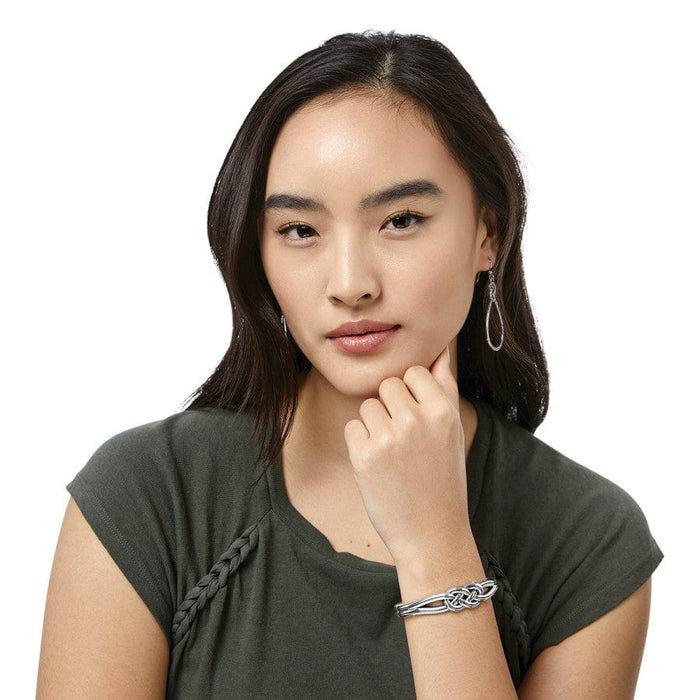Model wearing Interlok Hinged Bangle