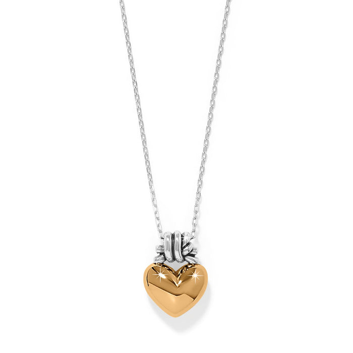 Brighton pendant necklace with gold-tone puffed heart and silver-tone chain in two-tone finish on a white background