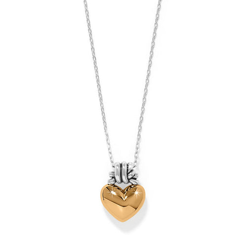 Brighton pendant necklace with gold-tone puffed heart and silver-tone chain in two-tone finish on a white background