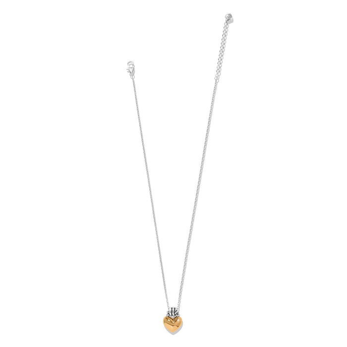 Brighton pendant necklace with two-tone heart pendant and silver-tone chain with lobster clasp on a white background