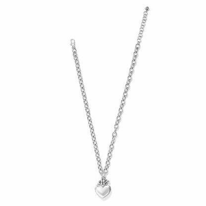 Brighton heart pendant necklace with silver-plated chain and polished puffed heart charm on a white background