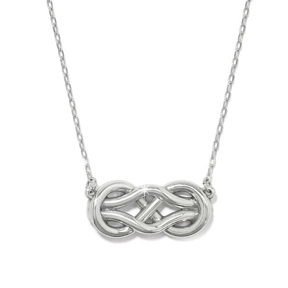 Brighton necklace with silver-plated interlocking double knot pendant on a delicate chain on a white background