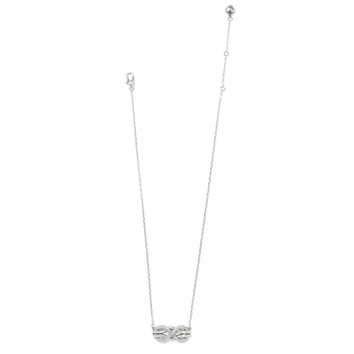 Brighton silver-plated necklace with crystal-accented infinity knot pendant and lobster clasp on a white background